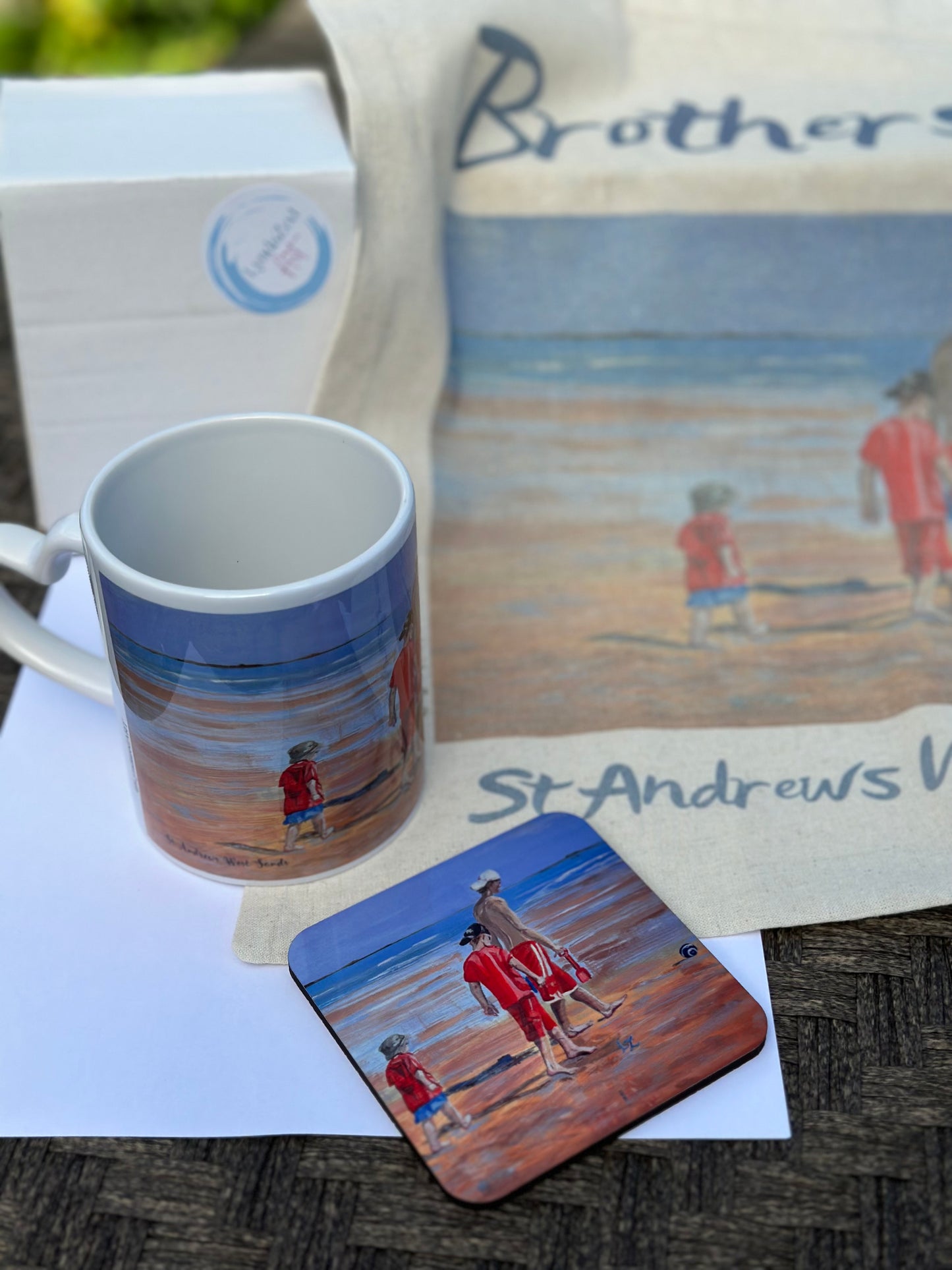 Giftbox The Brothers on St Andrews Beach, showing mug coaster and tote detail