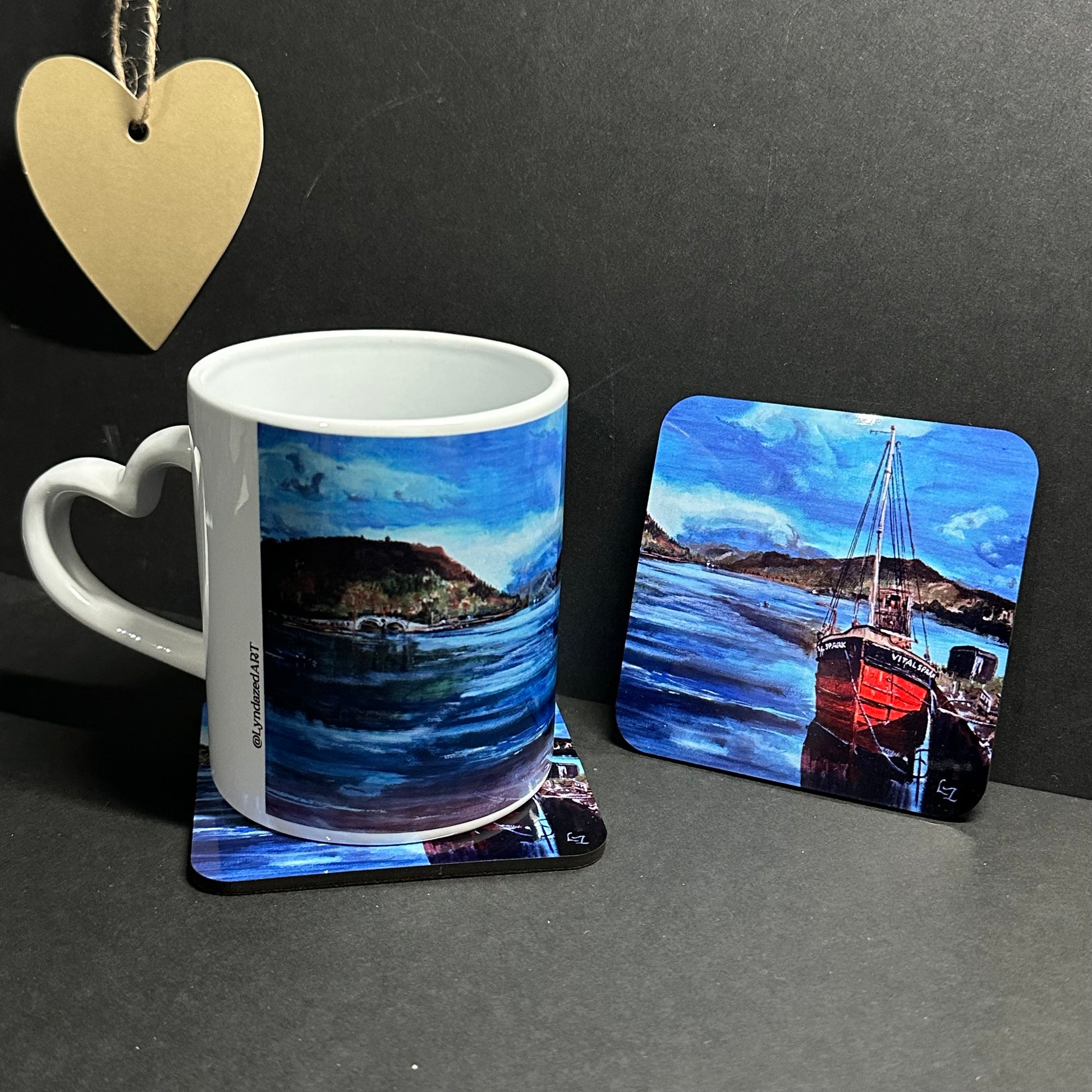 Mug and Coaster set the Vital Spark on Loch Fyne black bgd heart handle left and coaster detail